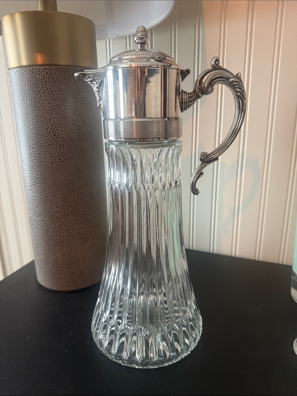 Elegant Clear Glass Pitcher with Decorative Silver-Tone Lid